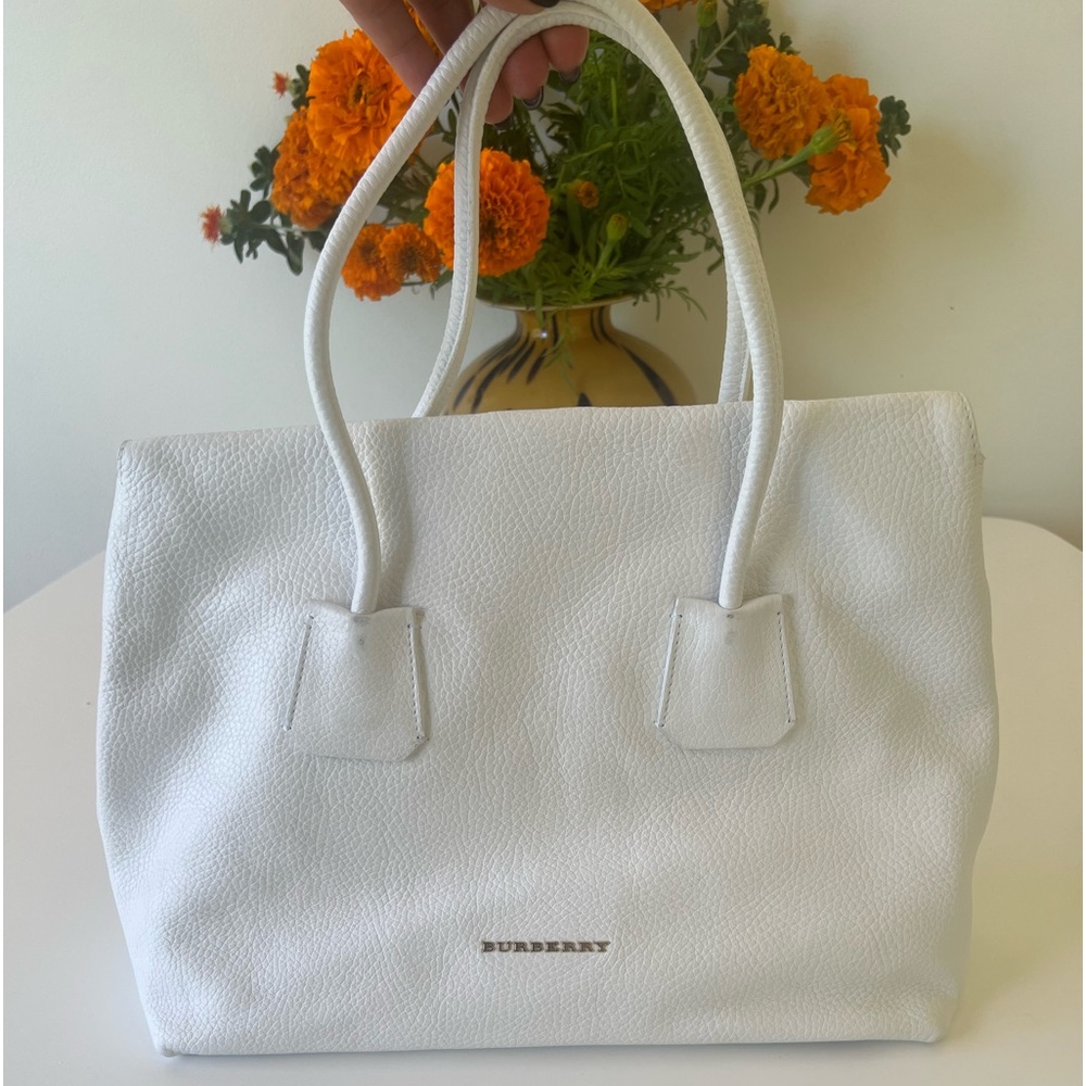- Burberry bag white color.